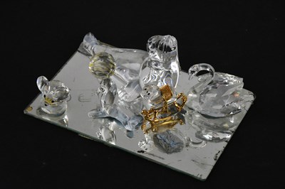 Lot 1200 - A collection of five Swarovski glass animals...