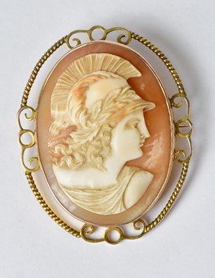 Lot 883 - A 9ct gold brooch set with a shell cameo...