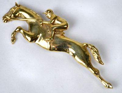 Lot 881 - A 9ct gold brooch in the form of a jockey...