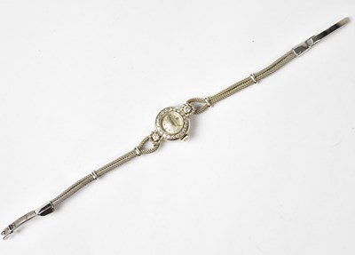 Lot 1048 - JUVENIA; an 18ct white gold cocktail watch,...