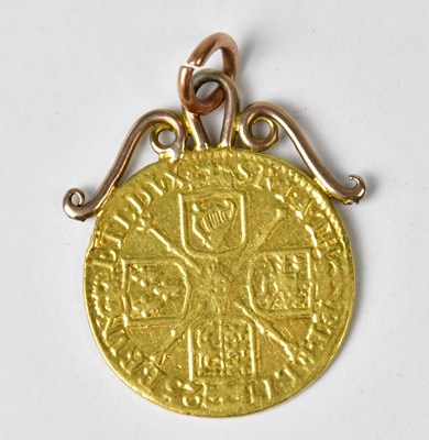 Lot 913 - A pendant in the form of a gold guinea dated...