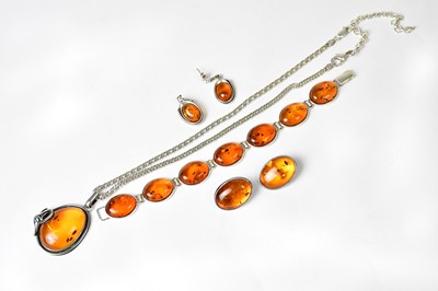 Lot 980 - A collection of silver amber-set jewellery,...