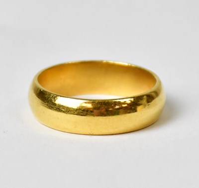 Lot 779 - A 22ct yellow gold wedding band, size Q,...