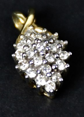Lot 898 - A 9ct yellow gold pendant of oval form with...