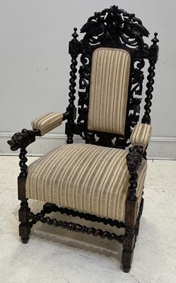 Lot 50 - A Victorian carved oak armchair, height 130cm.