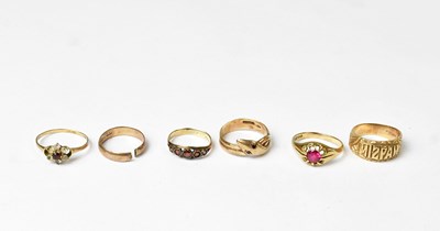 Lot 846 - Six 9ct gold rings, comprising a band engraved...
