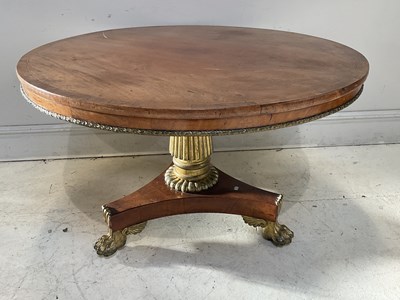 Lot 178 - A Regency mahogany and gilt painted circular...