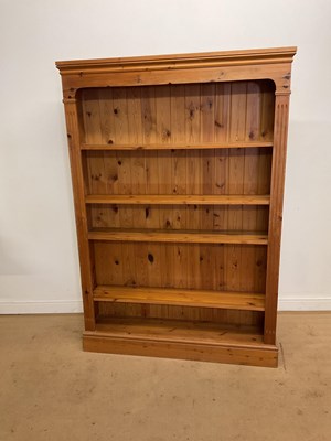 Lot 292 - A large pine open bookcase, width 123cm.