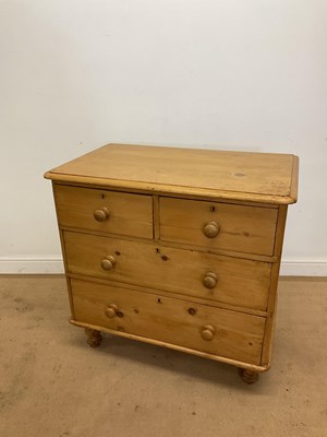 Lot 261 - A Victorian pine chest of two short over two...