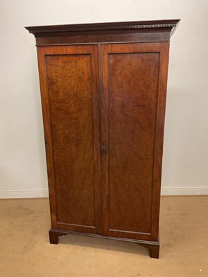 Lot 301 - An Edwardian mahogany two door wardrobe....