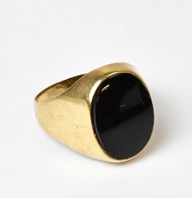 Lot 822 - A 9ct yellow gold signet ring set with an oval...