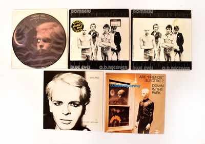 Lot 327 - GARY NUMAN; two copies of the double single...
