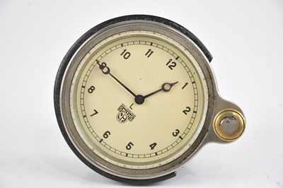 Lot 1003 - SMITHS; a vintage car clock, the dial set with...