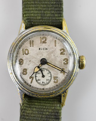 Lot 414 - ELGIN; a military issue wristwatch, the...