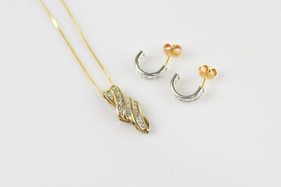 Lot 370 - A 9ct yellow gold diamond set pendant, length...