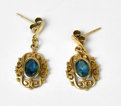 Lot 938 - A pair of yellow metal drop earrings, each set...