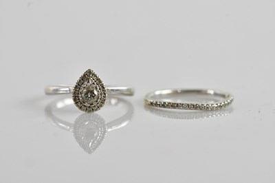 Lot 357 - A white metal diamond set dress ring, the pear...