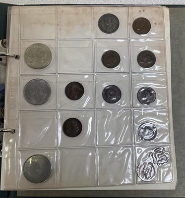 Lot 194 - An album of coins including twelve half crowns,...