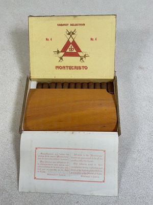 Lot 25 - MONTE CRISTO CIGARS; an opened box containing...