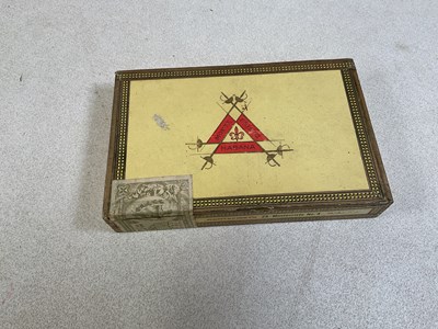 Lot 25 - MONTE CRISTO CIGARS; an opened box containing...