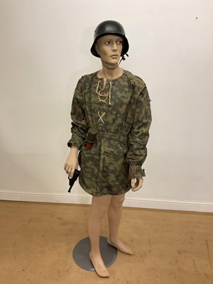 Lot 41 - A German military Waffen SS or DDR oak leaf...