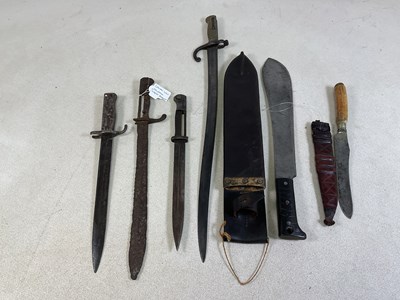 Lot 49 - A small group of various bayonets and military...