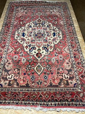Lot 229 - A Persian Hamadan red ground rug, 264 x 162cm.