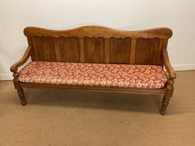 Lot 257 - A Victorian mahogany settle with shaped top...