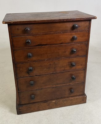 Lot 12 - A miniature mahogany and pine chest of six...