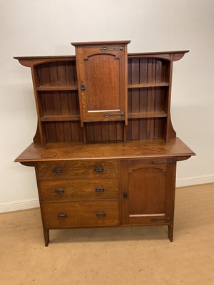 Lot 249 - An oak Arts and Crafts sideboard, the raised...