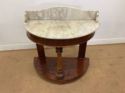 Lot 299 - A Victorian mahogany demi-lune marble topped...