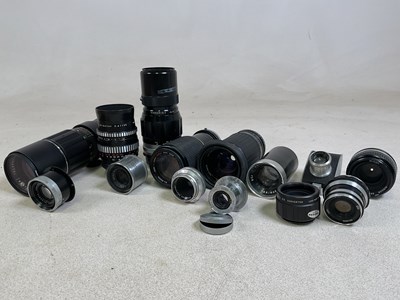 Lot 65 - A quantity of camera lenses, including Leica...