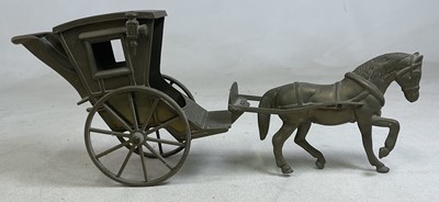 Lot 29 - A brass horse and carriage, length 59cm.