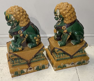 Lot 1429 - A pair of early 20th century Chinese temple...