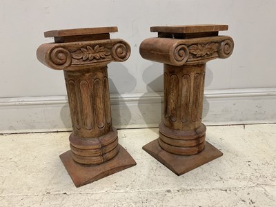 Lot 57 - A pair of carved oak Ionic columns, height...