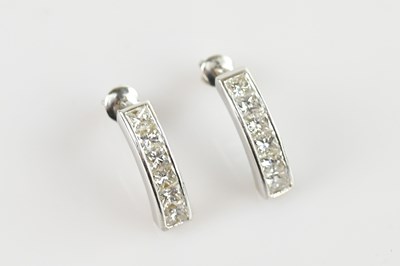 Lot 232 - A pair of 18ct white gold diamond six stone...