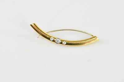 Lot 175 - An 18ct yellow gold diamond set three stone...