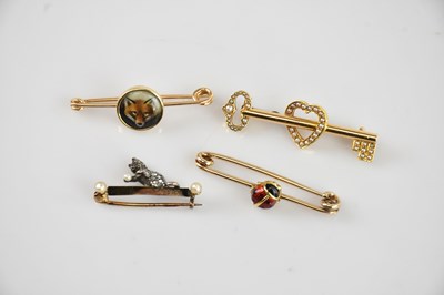 Lot 177 - A yellow metal and seed pearl bar brooch...