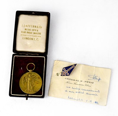 Lot 750 - A WWII medal relating to Lieut. W. T. Fielding...