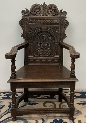 Lot 71 - An early 20th century carved oak wainscot type...