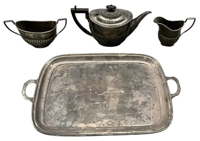 Lot 1099 - An early 20th century three piece silver...