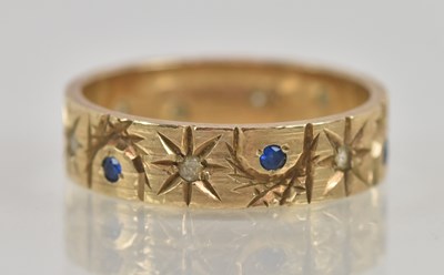 Lot 1279 - A 9ct yellow gold sapphire and white stone set...