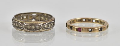 Lot 1280 - A yellow metal ruby and white stone set full...