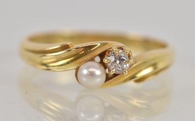 Lot 1223 - An 18ct yellow gold seed pearl and diamond set...