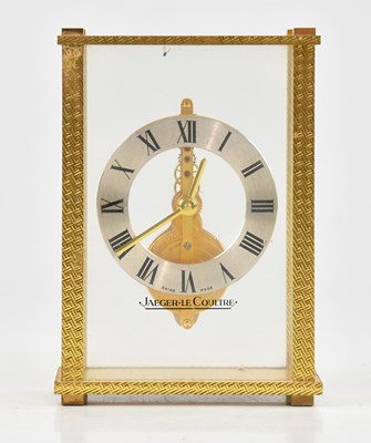 Lot 200 - JAEGER-LECOULTRE; a brass cased timepiece, the...