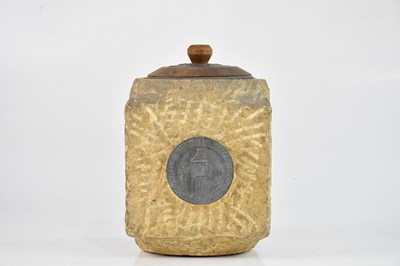 Lot 265 - A carved stone tobacco jar and wooden cover...
