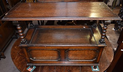 Lot 1632 - An early 20th century oak monk's bench