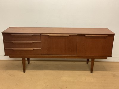 Lot 539 - A mid 20th century teak sideboard, height 74cm,...