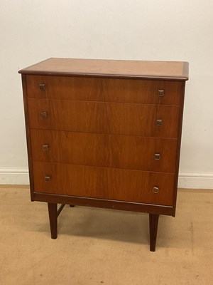 Lot 540 - A mid 20th century teak chest of drawers,...