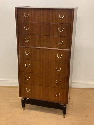 Lot 541 - G PLAN; a 'Librenza' seven drawer tallboy on...